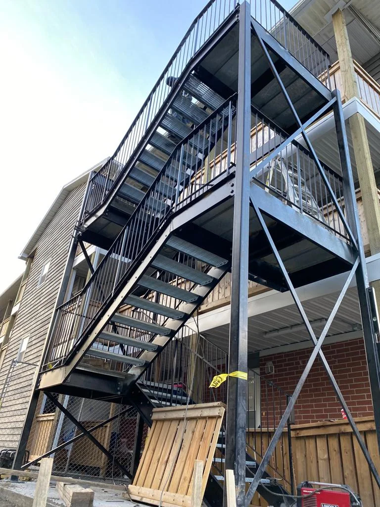 Fabricated fire-escape platforms and stair flights by BriteArc Fabricators