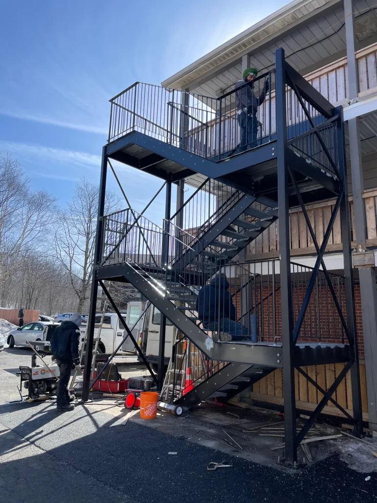 Completed multi-storey exterior fire escape by BriteArc Fabricators