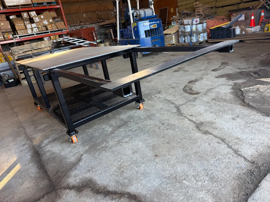 Completed shop-fabricated steel work table by BriteArc Fabricators