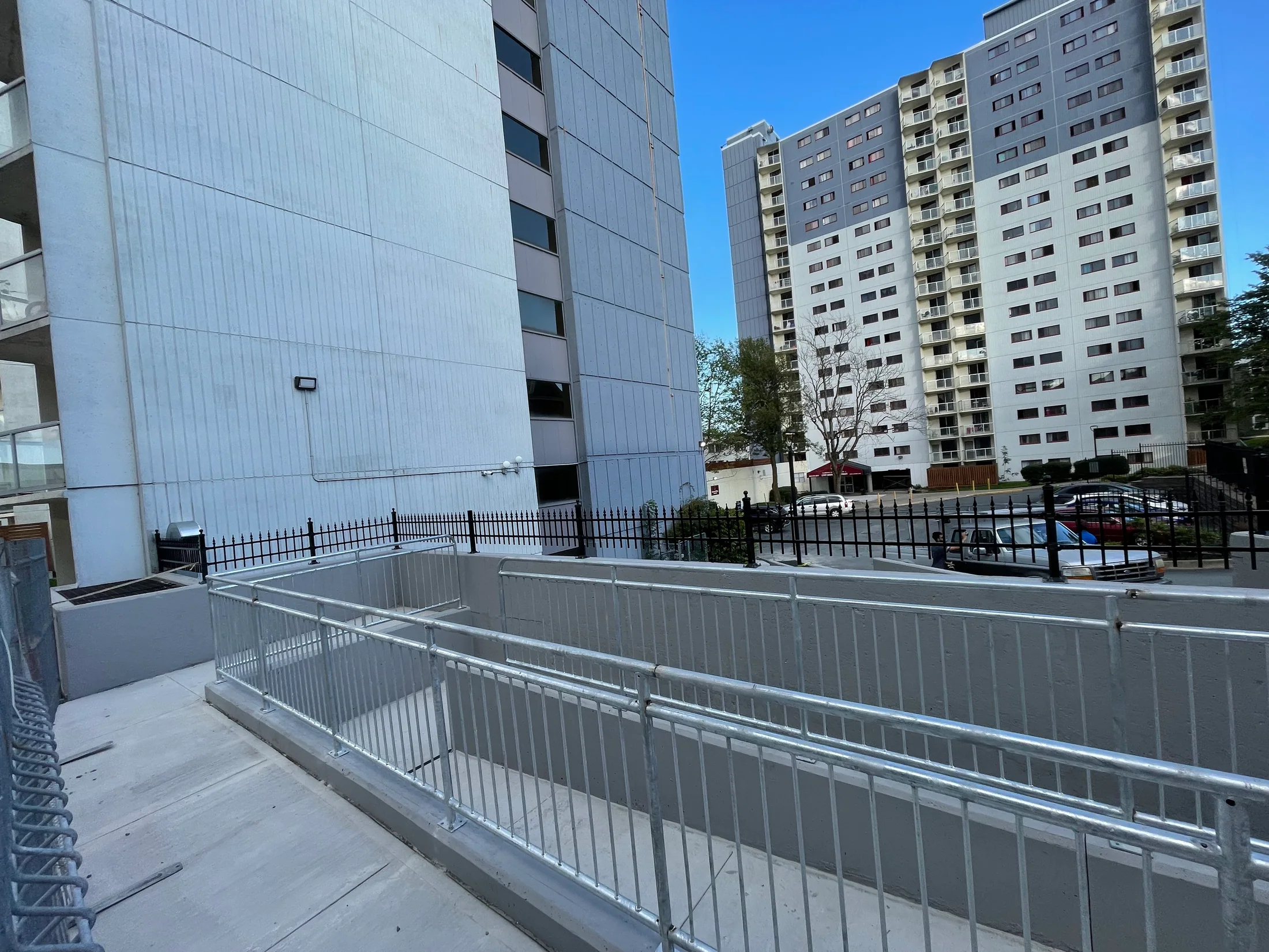 Commercial aluminum guardrails along an accessible route by BriteArc Fabricators