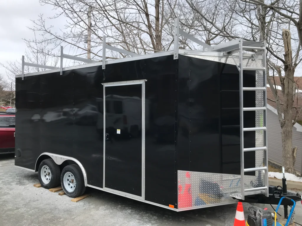 Completed enclosed utility trailer and rear access ladder by BriteArc Fabricators