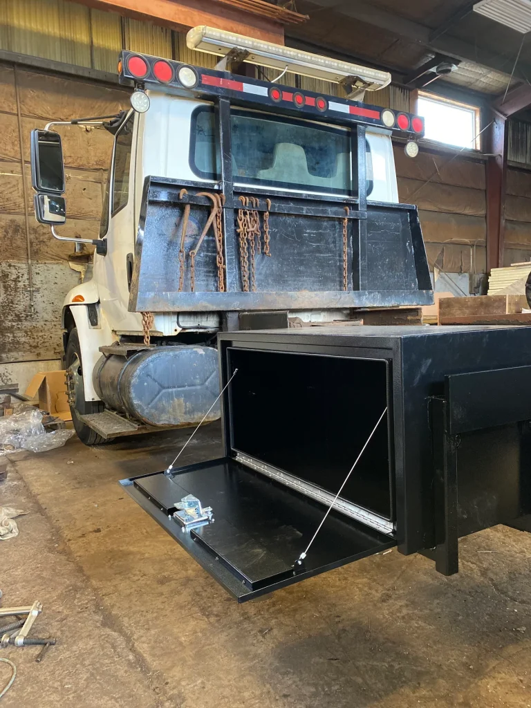 Fabricated truck toolbox and step assembly by BriteArc Fabricators