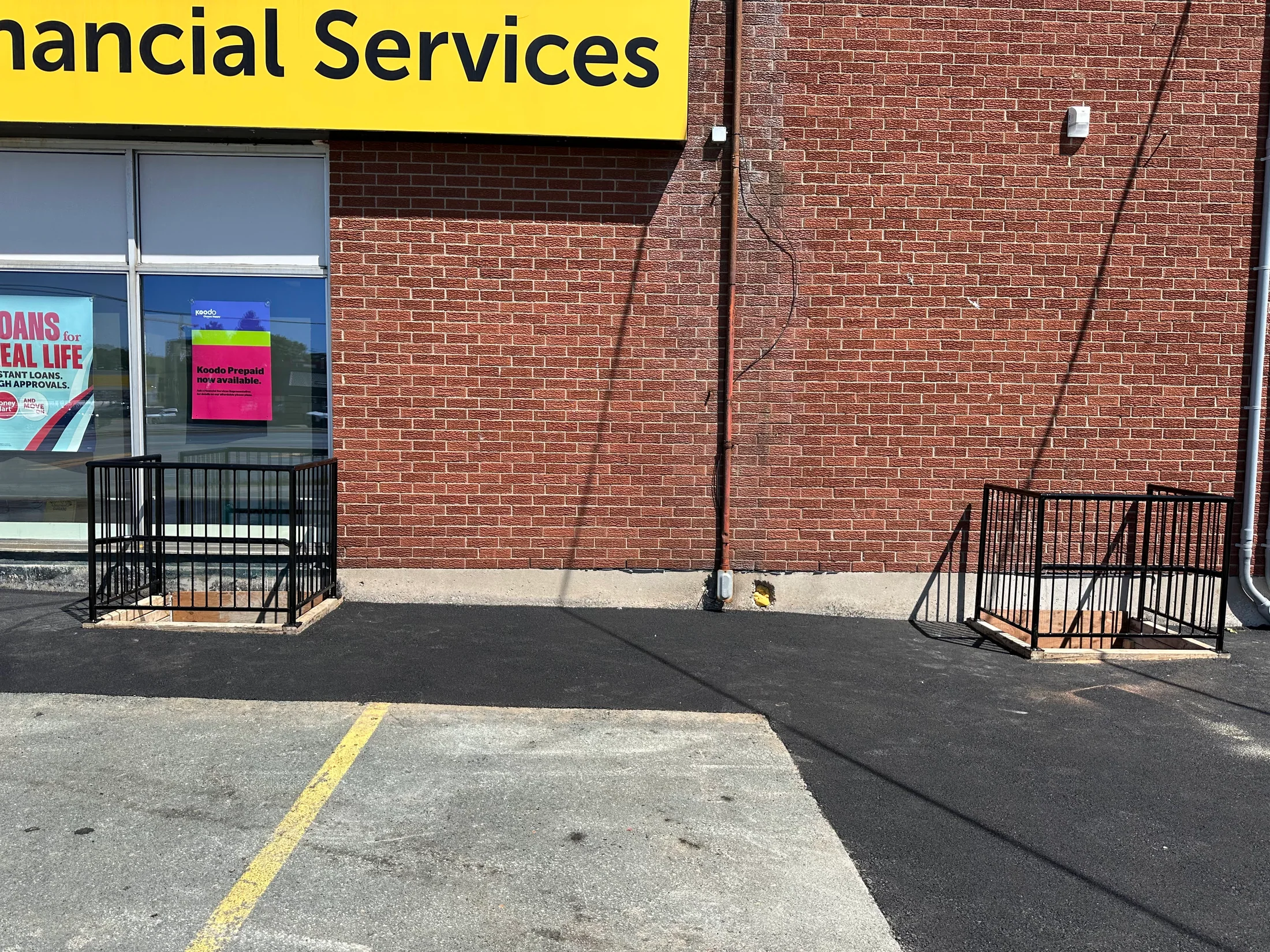 Commercial property with completed entry railings by BriteArc Fabricators