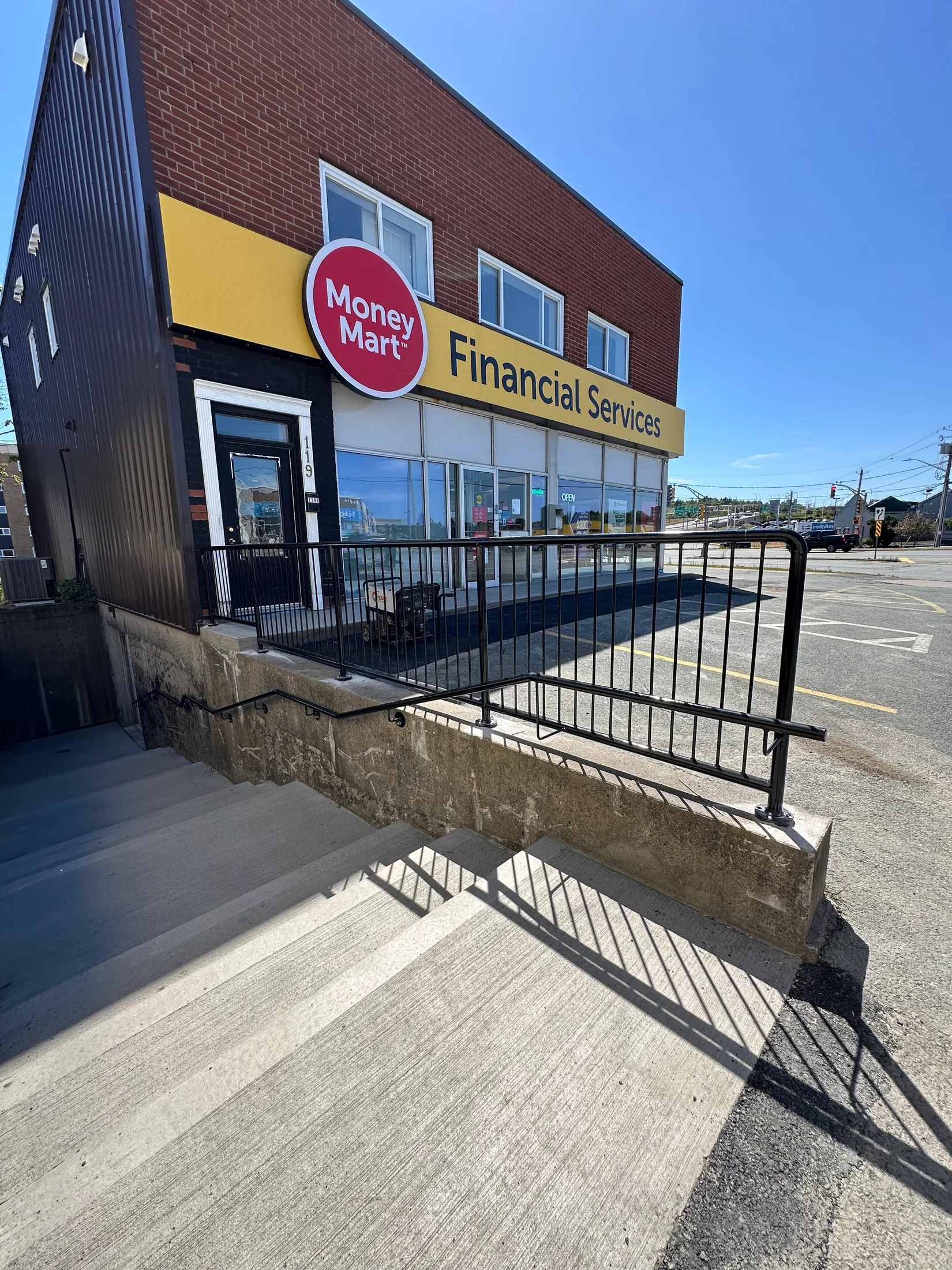 Completed guardrail at the main commercial entrance by BriteArc Fabricators