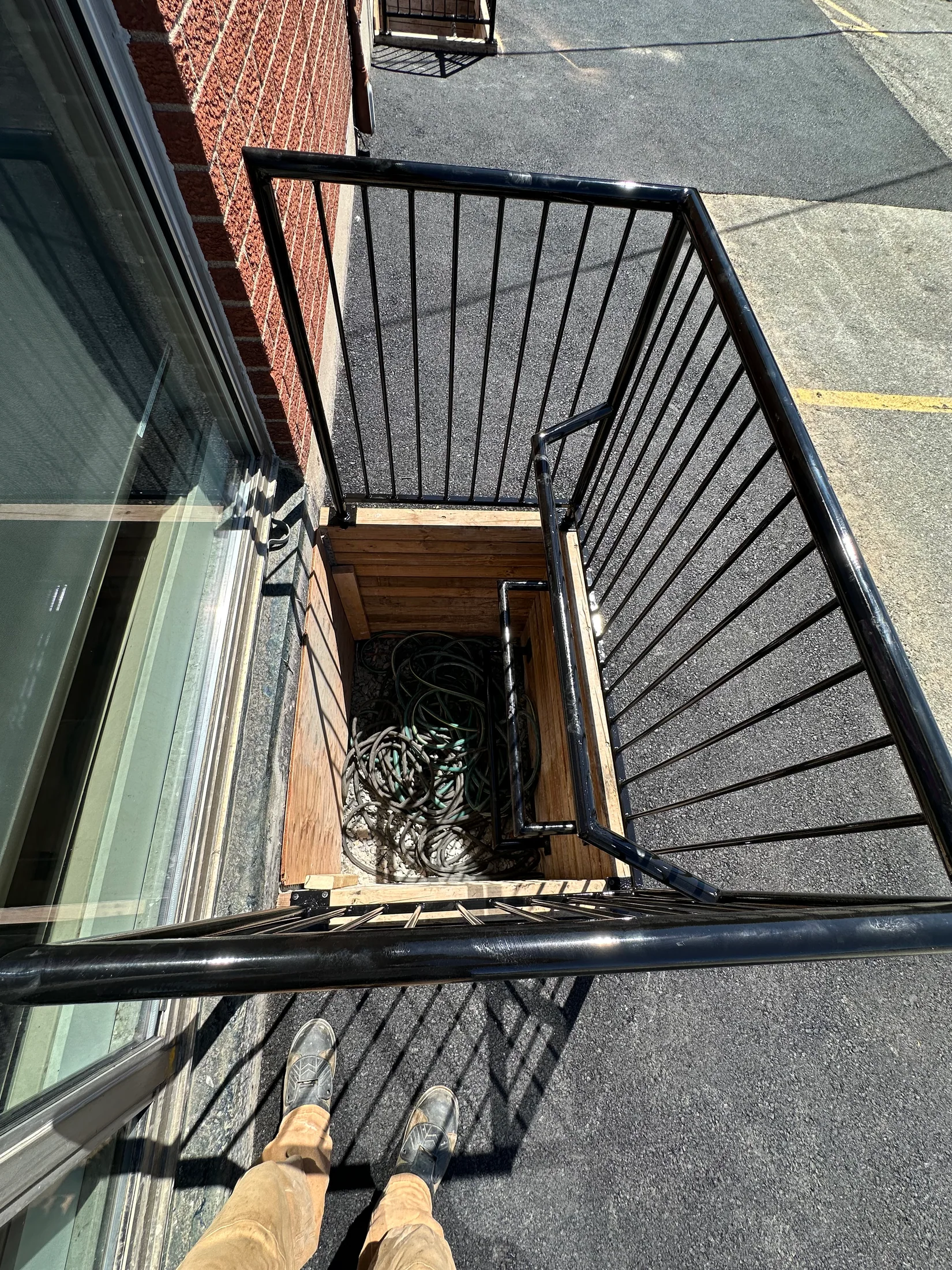 Guardrail around a lower commercial entrance by BriteArc Fabricators