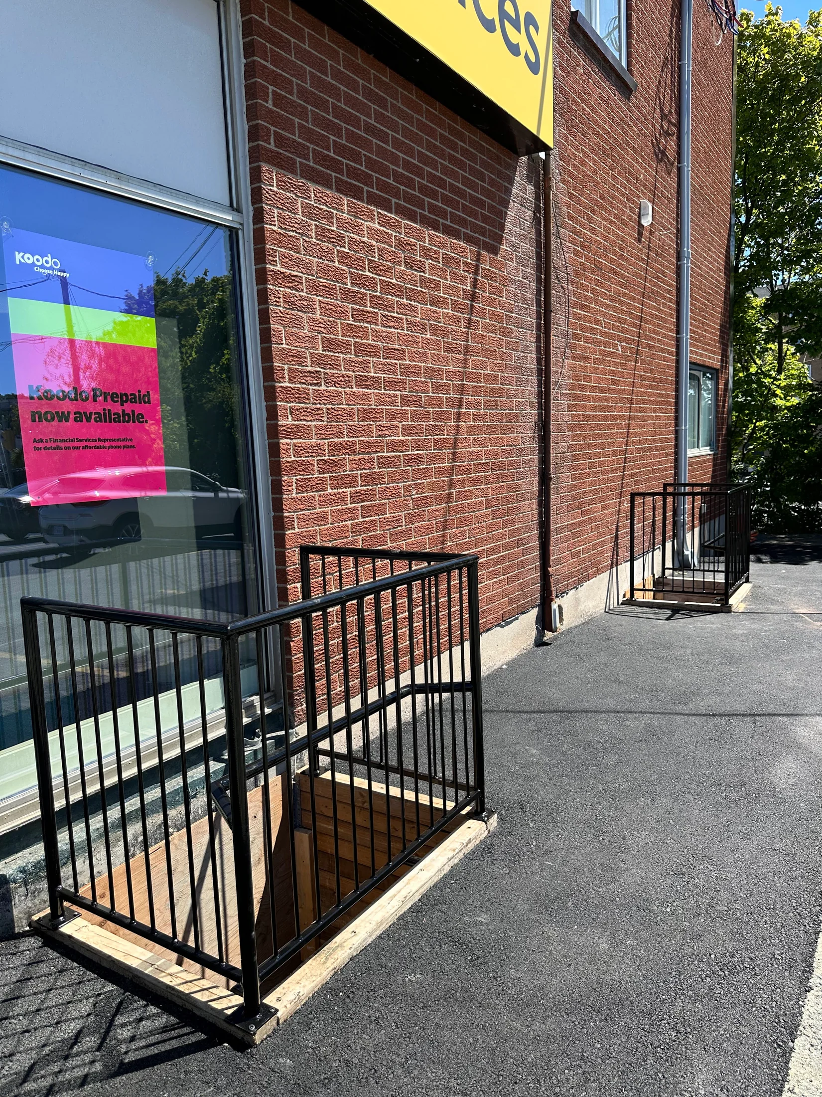 Completed commercial entrance railing by BriteArc Fabricators