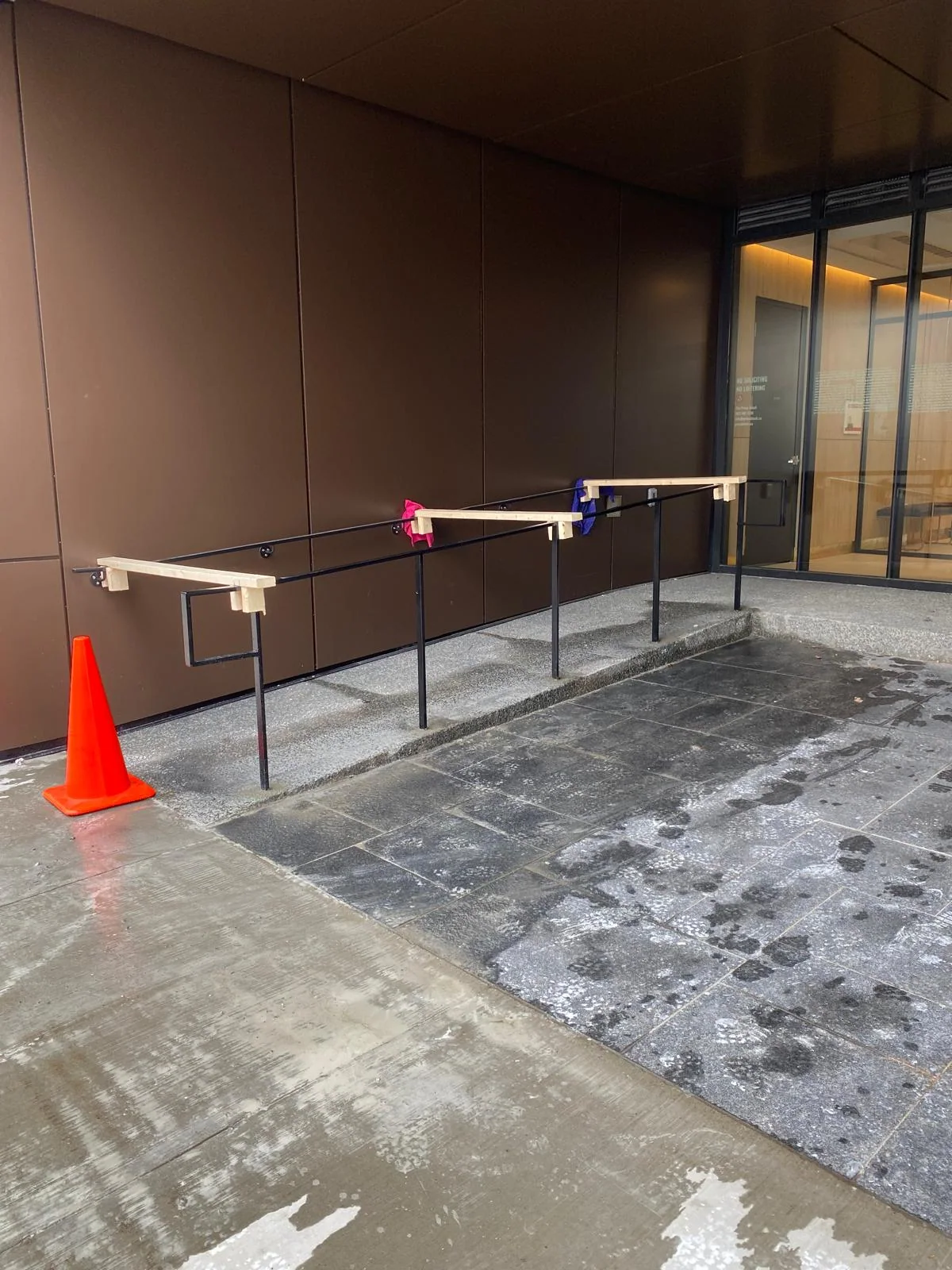 Freestanding handrail run during installation by BriteArc Fabricators