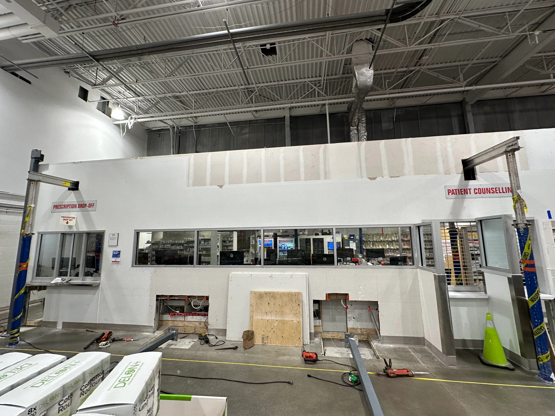 Retail warehouse work area prepared for access steel installation by BriteArc Fabricators