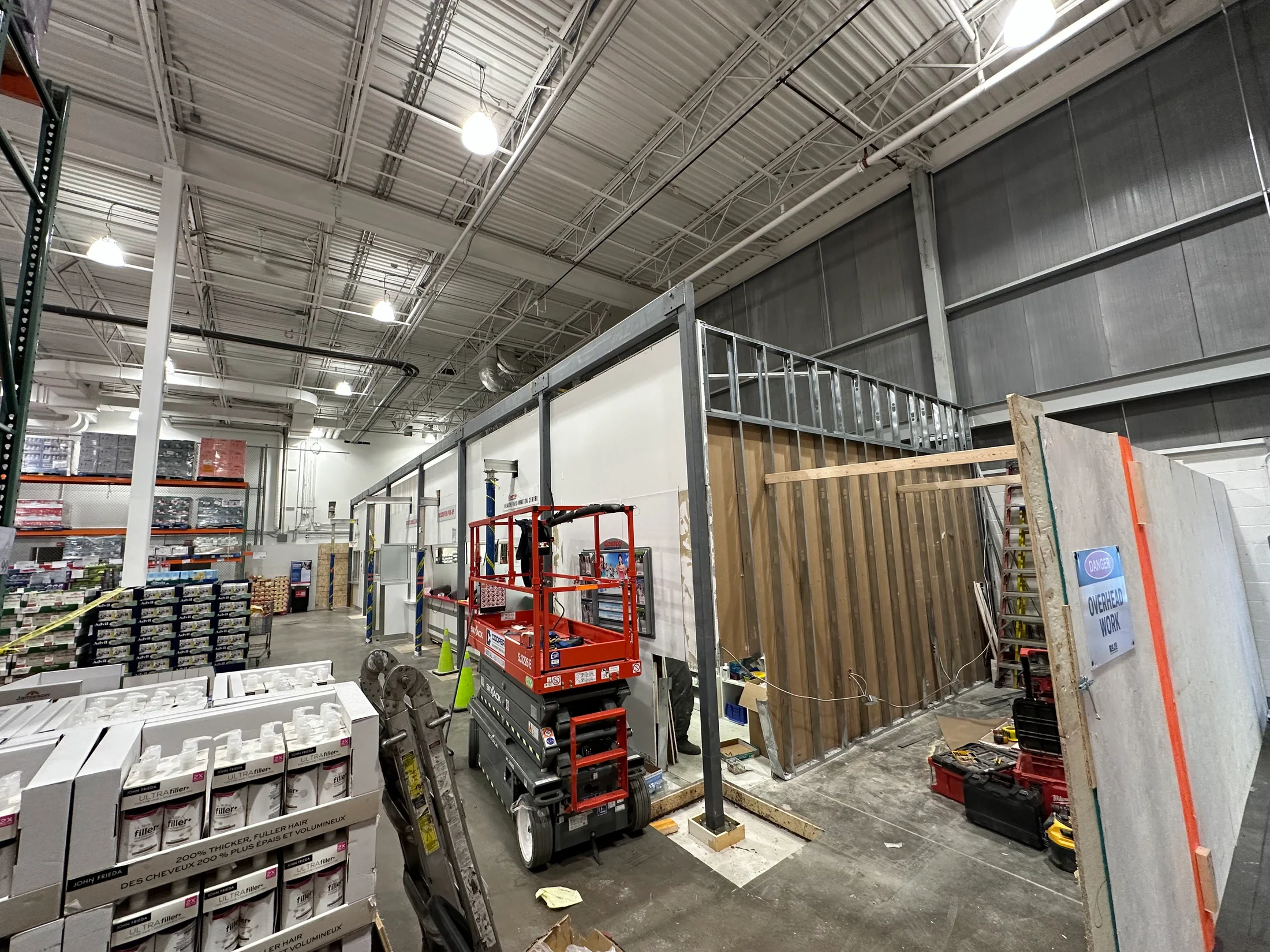 Completed wall and access route inside the retail warehouse by BriteArc Fabricators