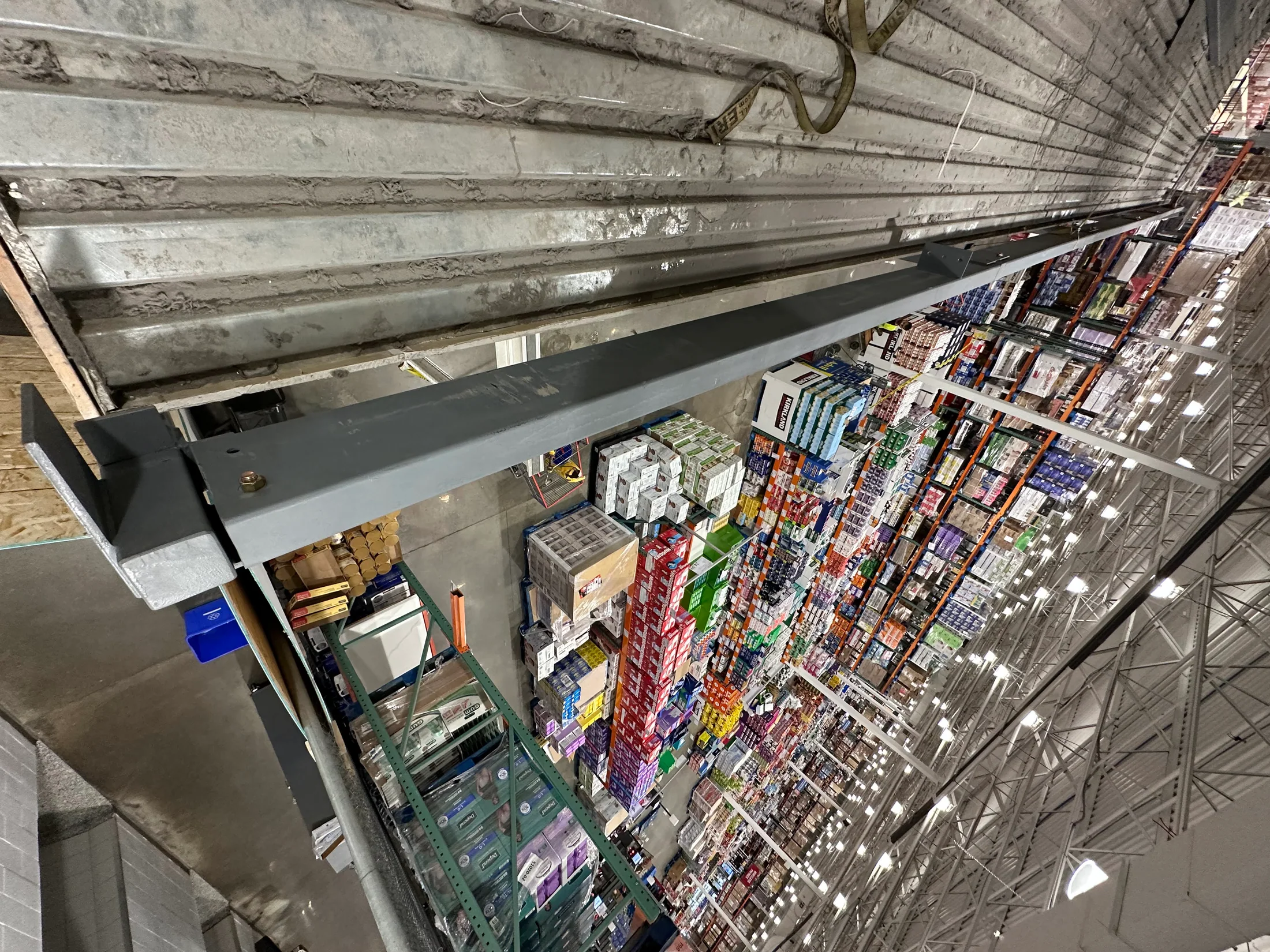 Access platform steelwork overlooking the retail floor by BriteArc Fabricators