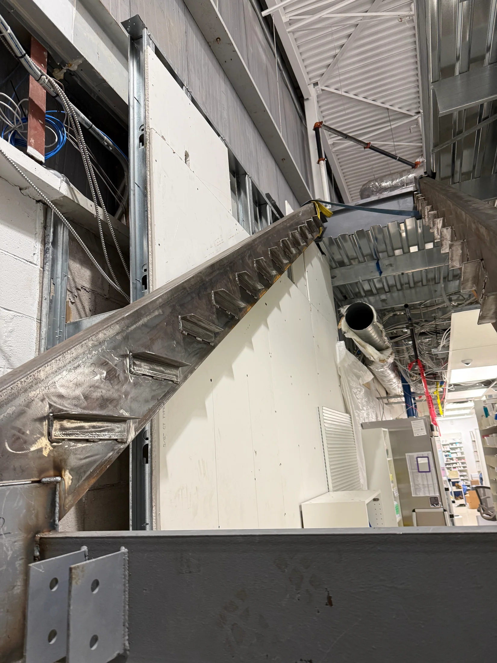 Installed stair and landing structure by BriteArc Fabricators