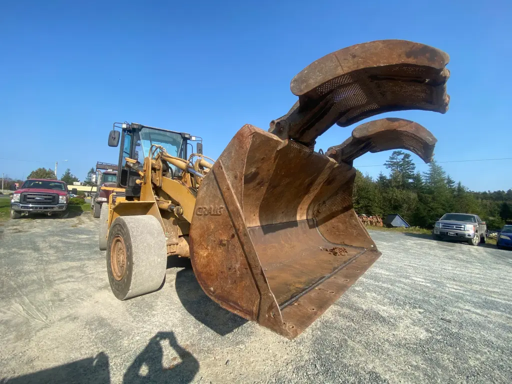 Repaired loader bucket returned for service by BriteArc Fabricators