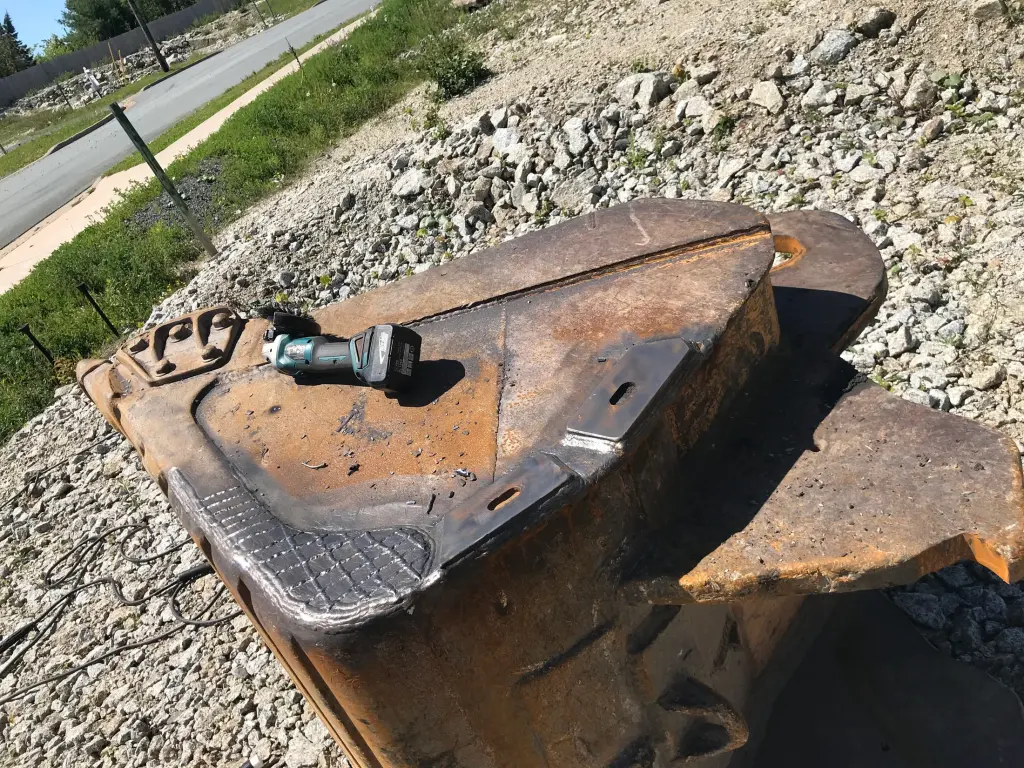 Reinforced bucket corners and wear surfaces by BriteArc Fabricators