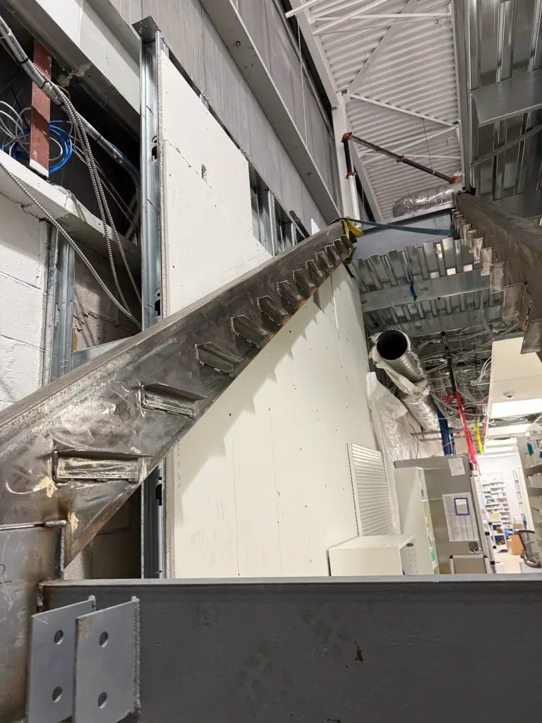 Installed stair and landing structure by BriteArc Fabricators